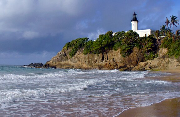 Faro Punta Tuna lighthouse east beach view