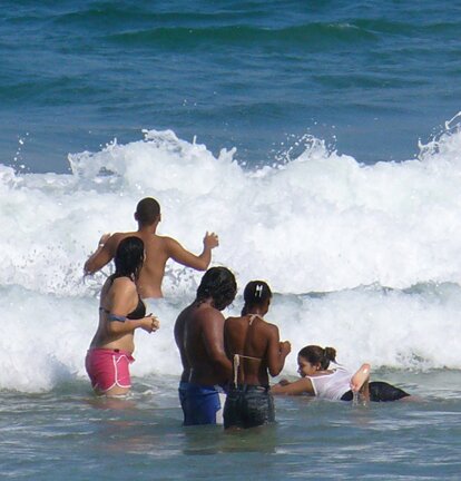 swimming at Luquillo beach in the surf.